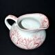 Pexonne earthenware vase/jug with a red floral rustic design