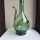 Pair of blown glass wine decanters in blue/green hues.