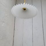 Toothed opaline suspension