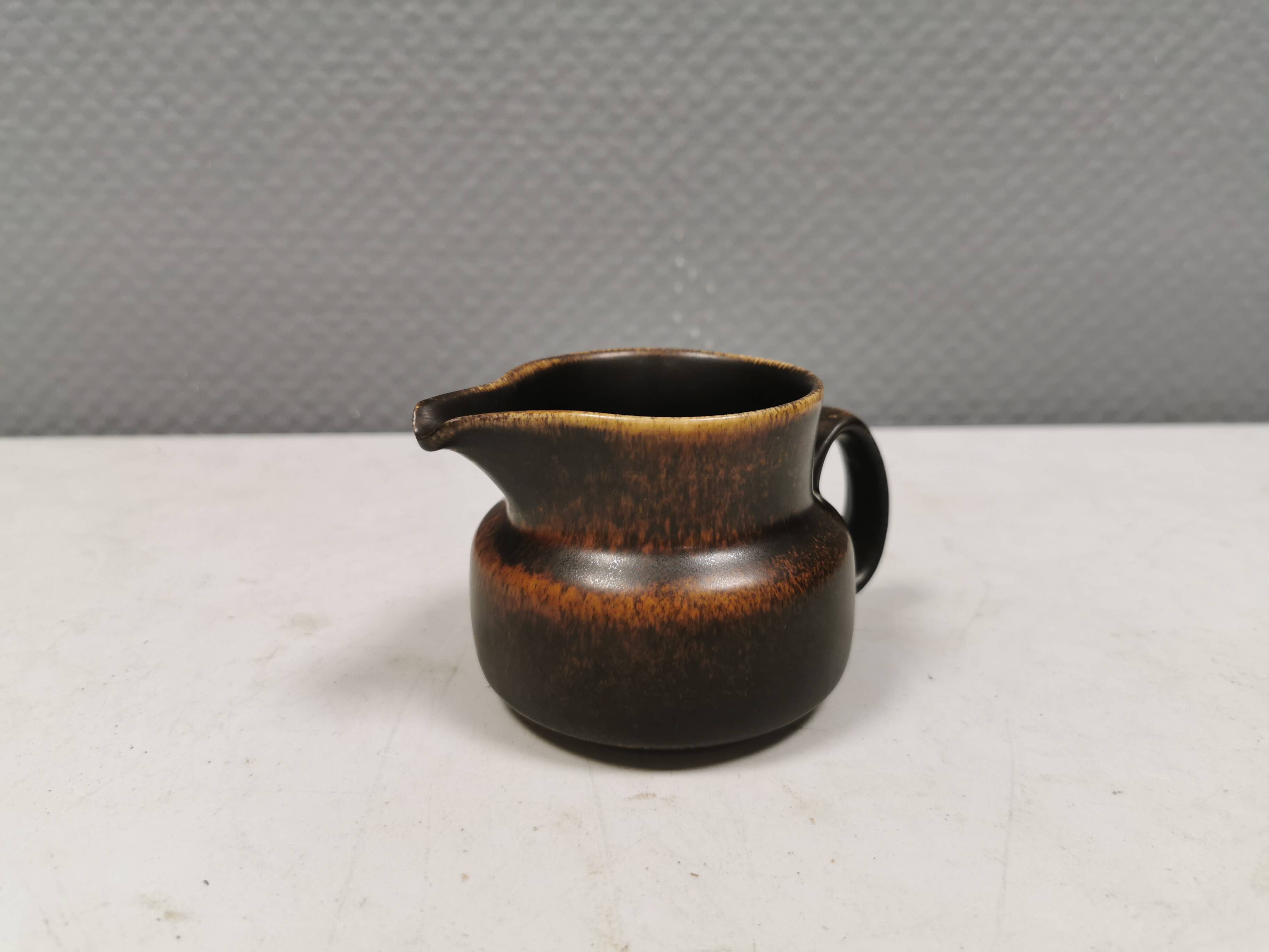 Very nice cream jug in hare fur glaze, Danish and from the 1970-80s.