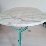 White marble bistro table with oval top