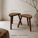 Pair of rustic tripod stools in solid wood, brutalist style.