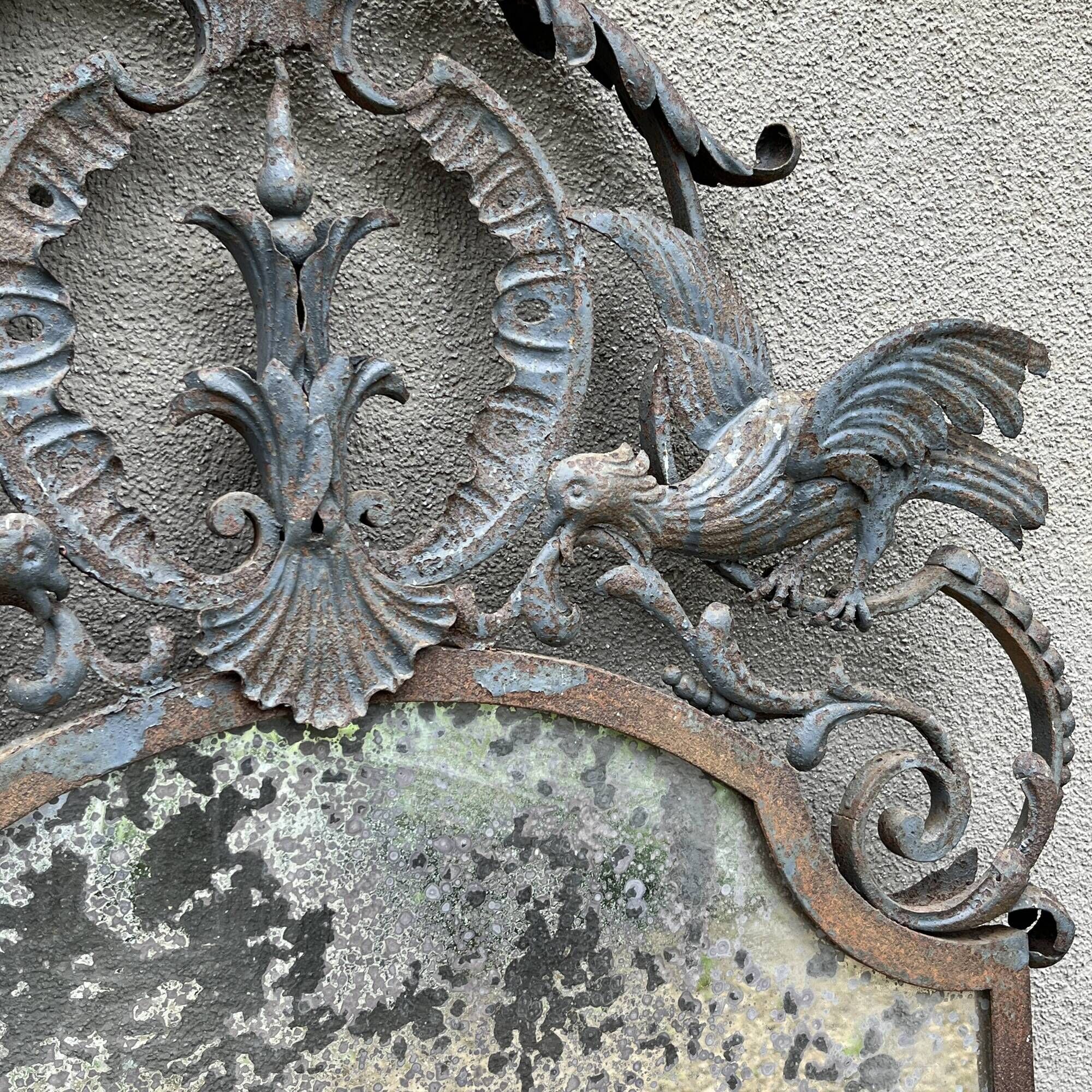 Art Deco wrought iron bird mirror in the style of Gilbert Poillerat, circa 1930