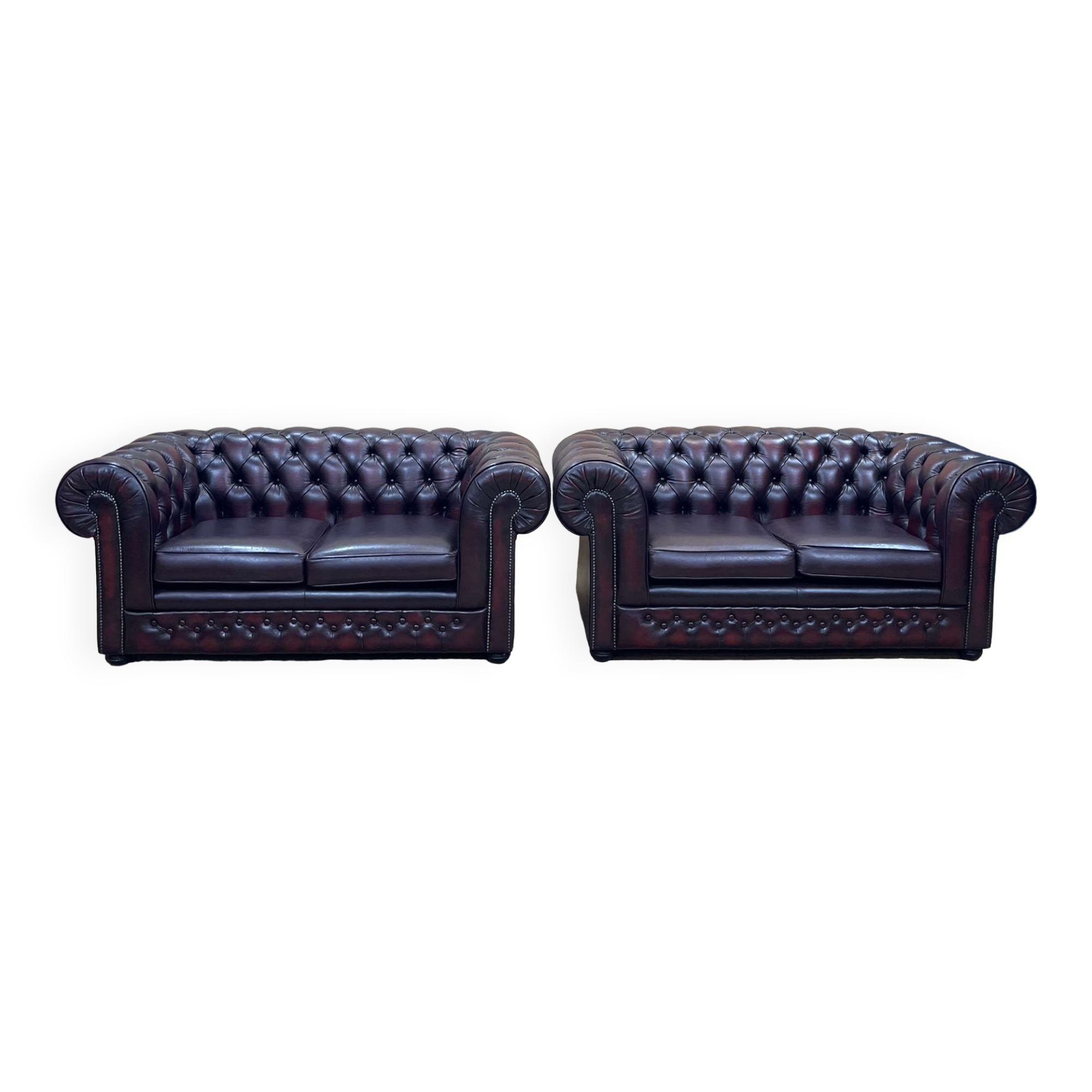 Pair of 2-seater leather Chesterfield sofas from the 1990s by Thomas LLOYD