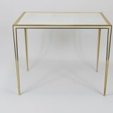 A pair of brass and white mirror tables from Vereinigte Werkstätten, Germany, 1970s.