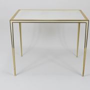 A pair of brass and white mirror tables from Vereinigte Werkstätten, Germany, 1970s.