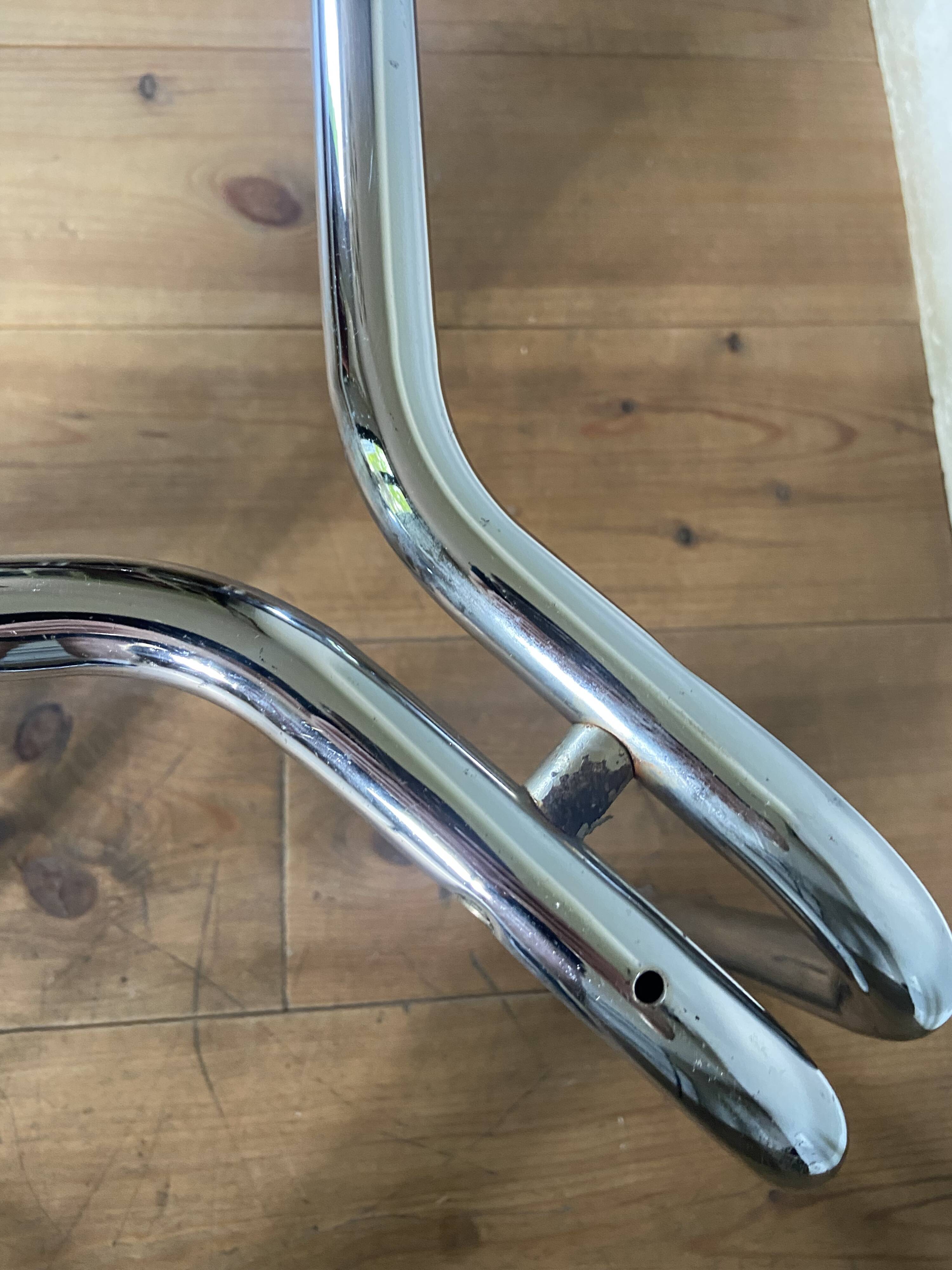 Vintage 70s table in tubular chrome and smoked glass