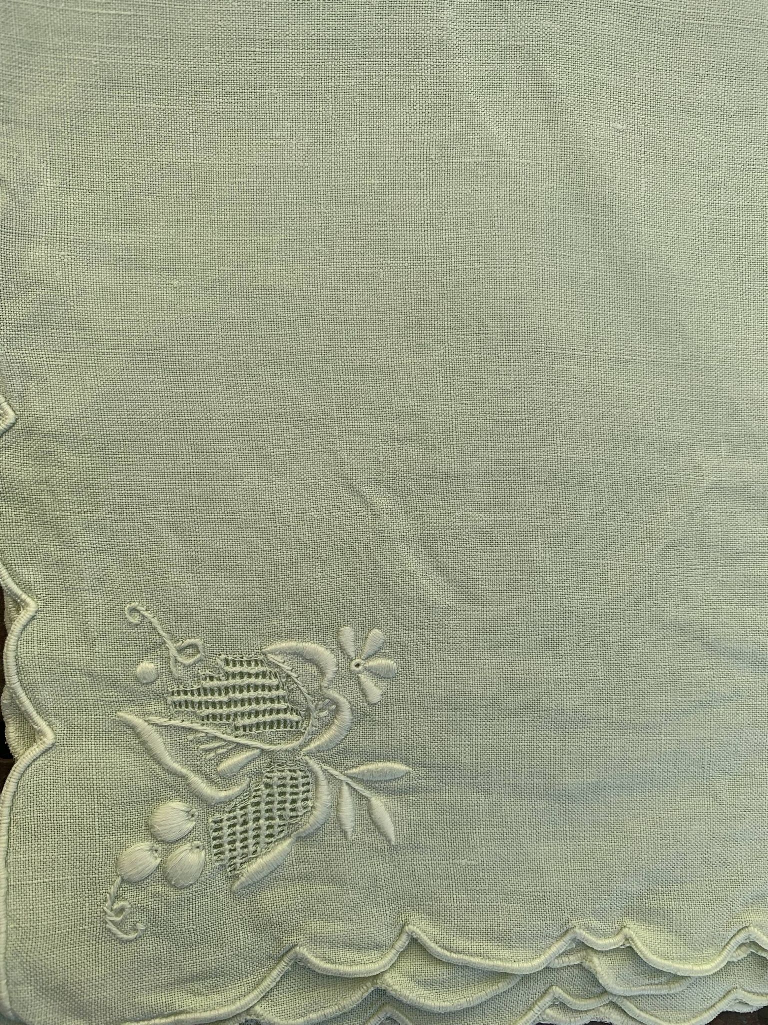 4 small tea towels, mismatched in linen, embroidered, two with flowers and two with fishermen