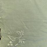 4 small tea towels, mismatched in linen, embroidered, two with flowers and two with fishermen