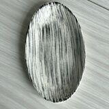 Black and white designer pocket emptier