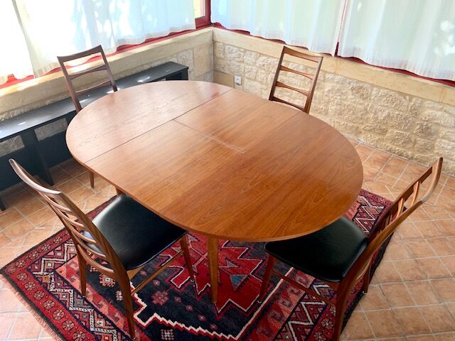 Expandable teak dining table, butterfly extension, circa 60s