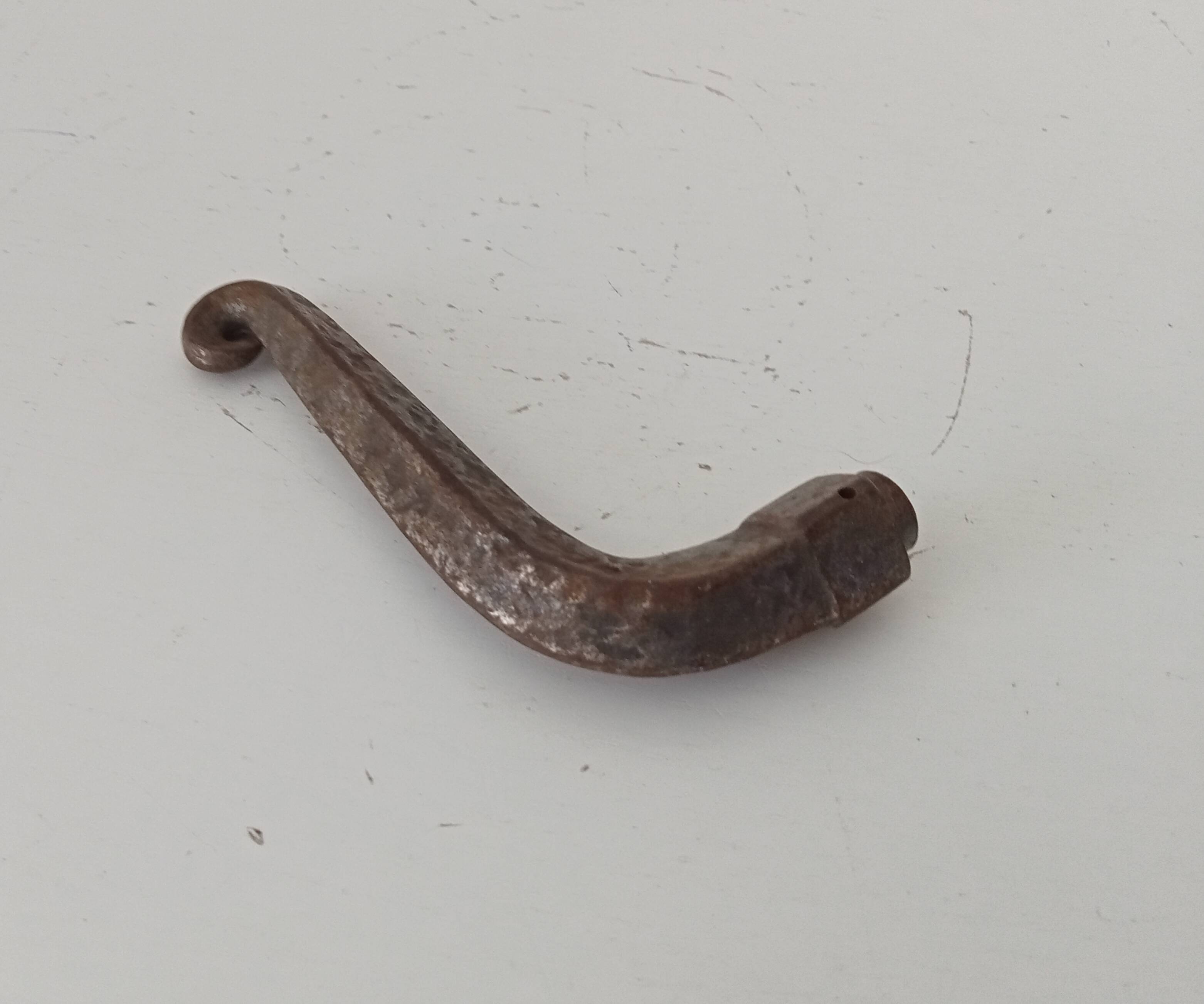 19th-century antique door handle in forged steel