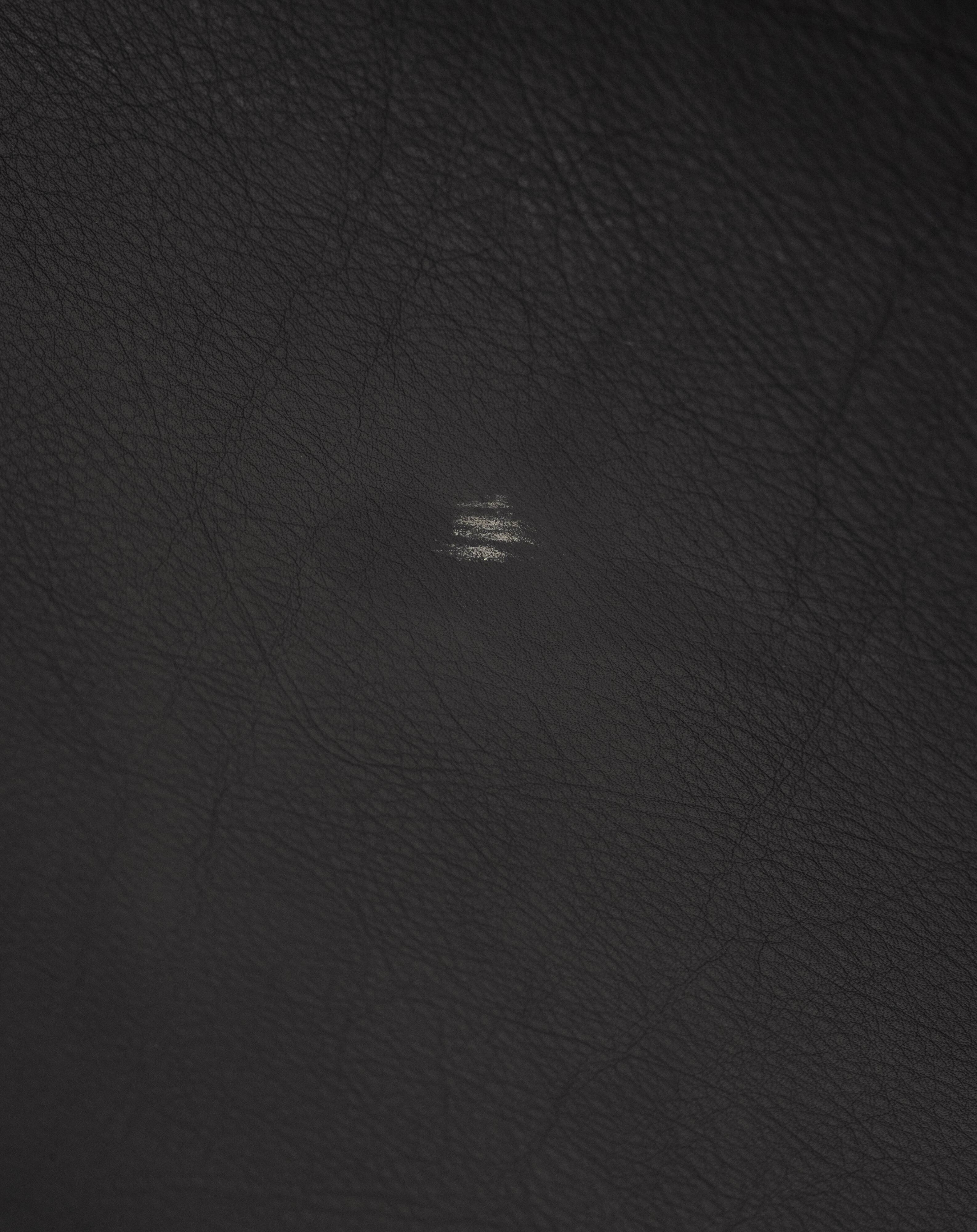 Obliqua two-seater leather sofa, Mario Botta, 1980s