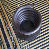 Spiral metal candle holder spring with candle, bronze appearance