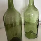 Pair of large antique blown glass bottles