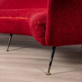 Large 1950s vintage curved sofa in red velvet italian design