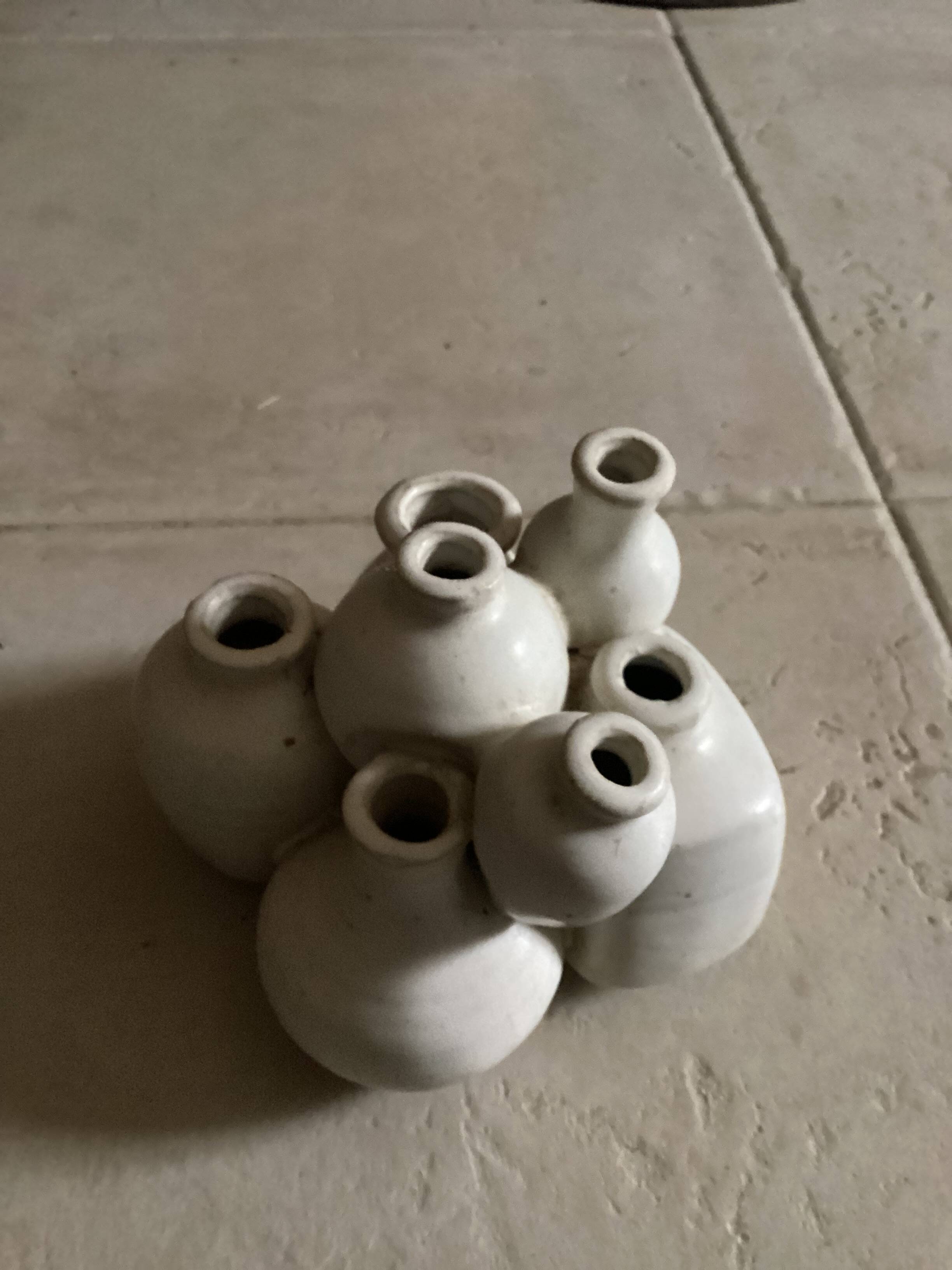 Beige ceramic flower pick