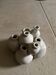Beige ceramic flower pick