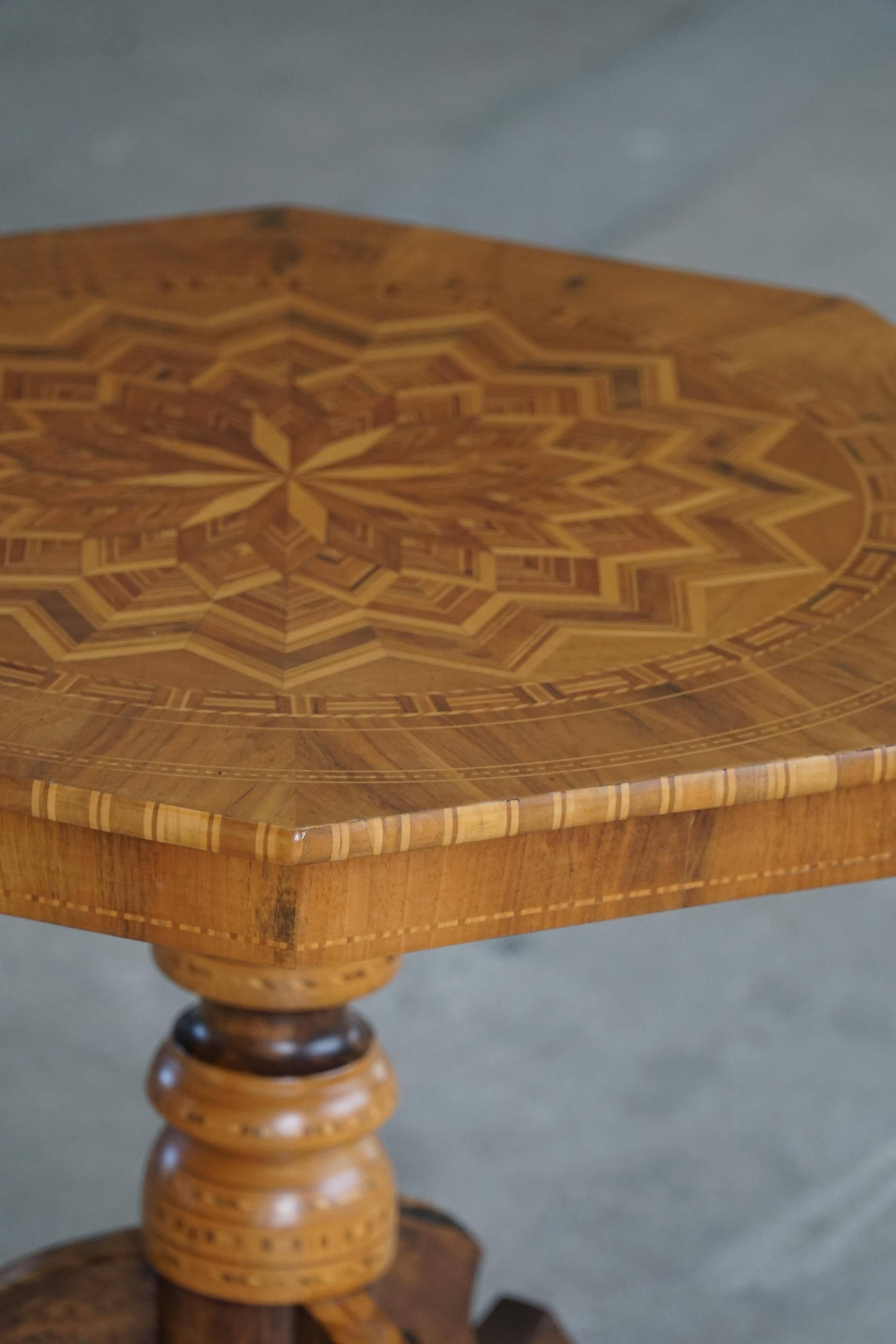Danish Art Deco octagonal side table in birch with an inlaid top, 1940s.
