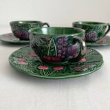 3 earthenware cups and saucers in barbotine fruit decor Salins vintage
