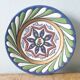 Decorative wall plate signed A. Alvarez