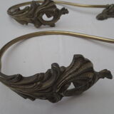 Pair of embraces in numerotée solid brass, rocaille style