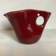 Old burgundy pitcher