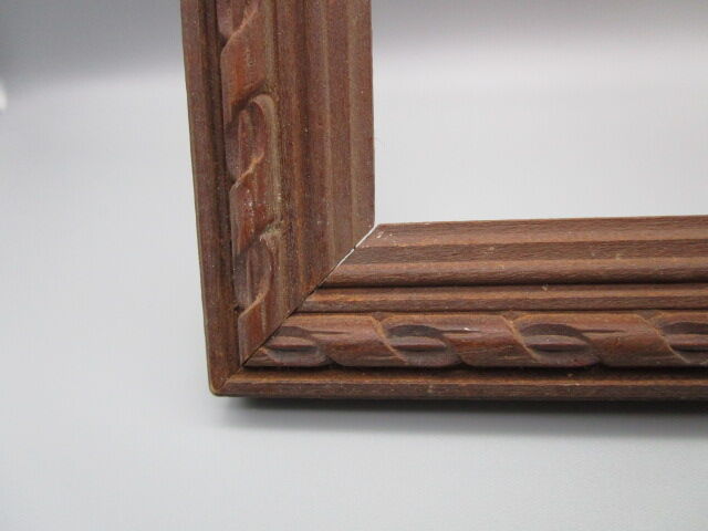 Old frame in worked wood