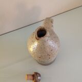 Bottle with CAP in sandstone with signature vintage