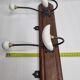 Bistro wall rack in porcelain, metal and wood, vintage