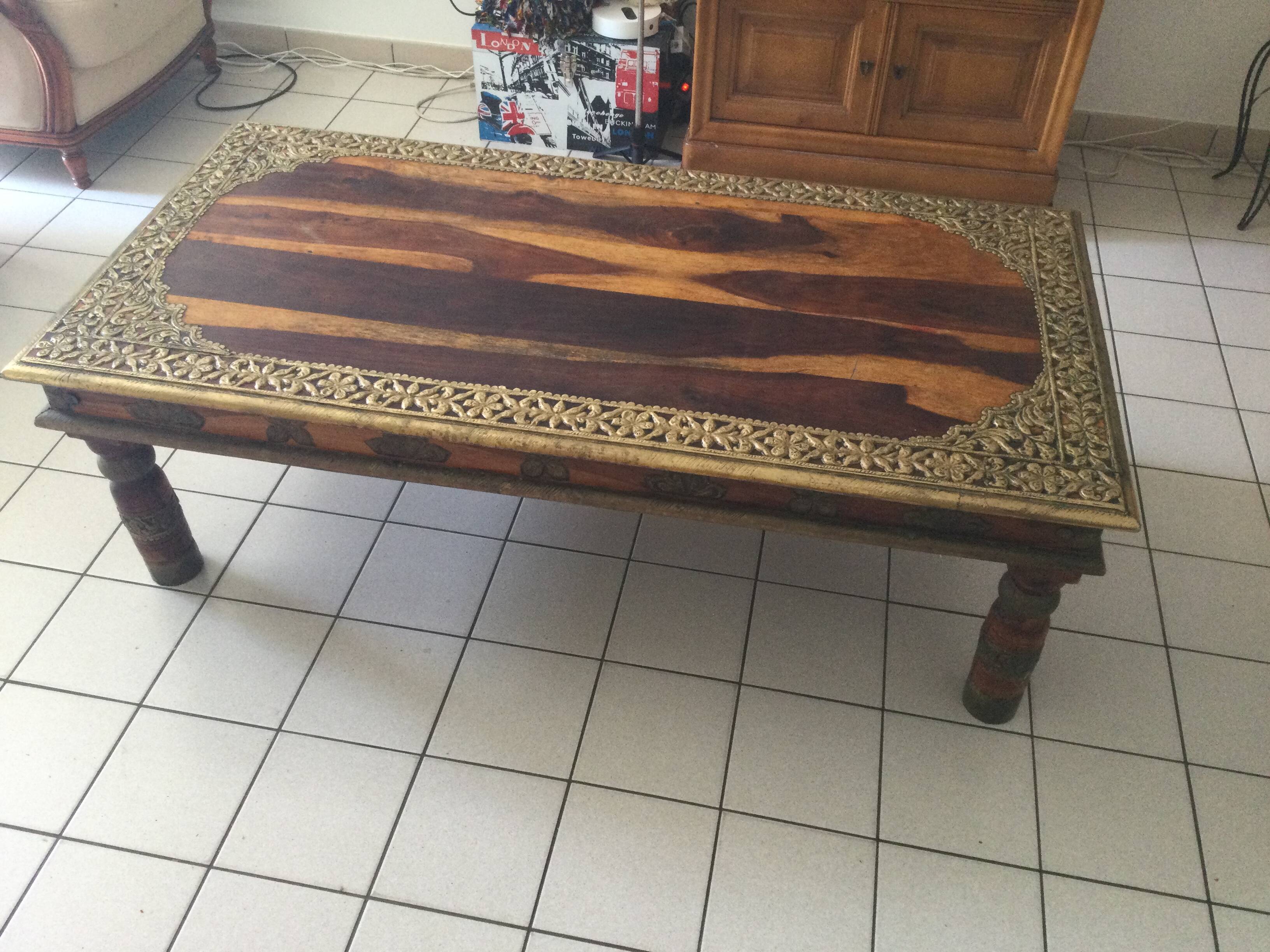 Large vintage Indian coffee table made of solid sheesham wood and brass.