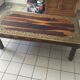 Large vintage Indian coffee table made of solid sheesham wood and brass.