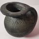 Vintage native american jug pot with geometric patterns in green / gray tones