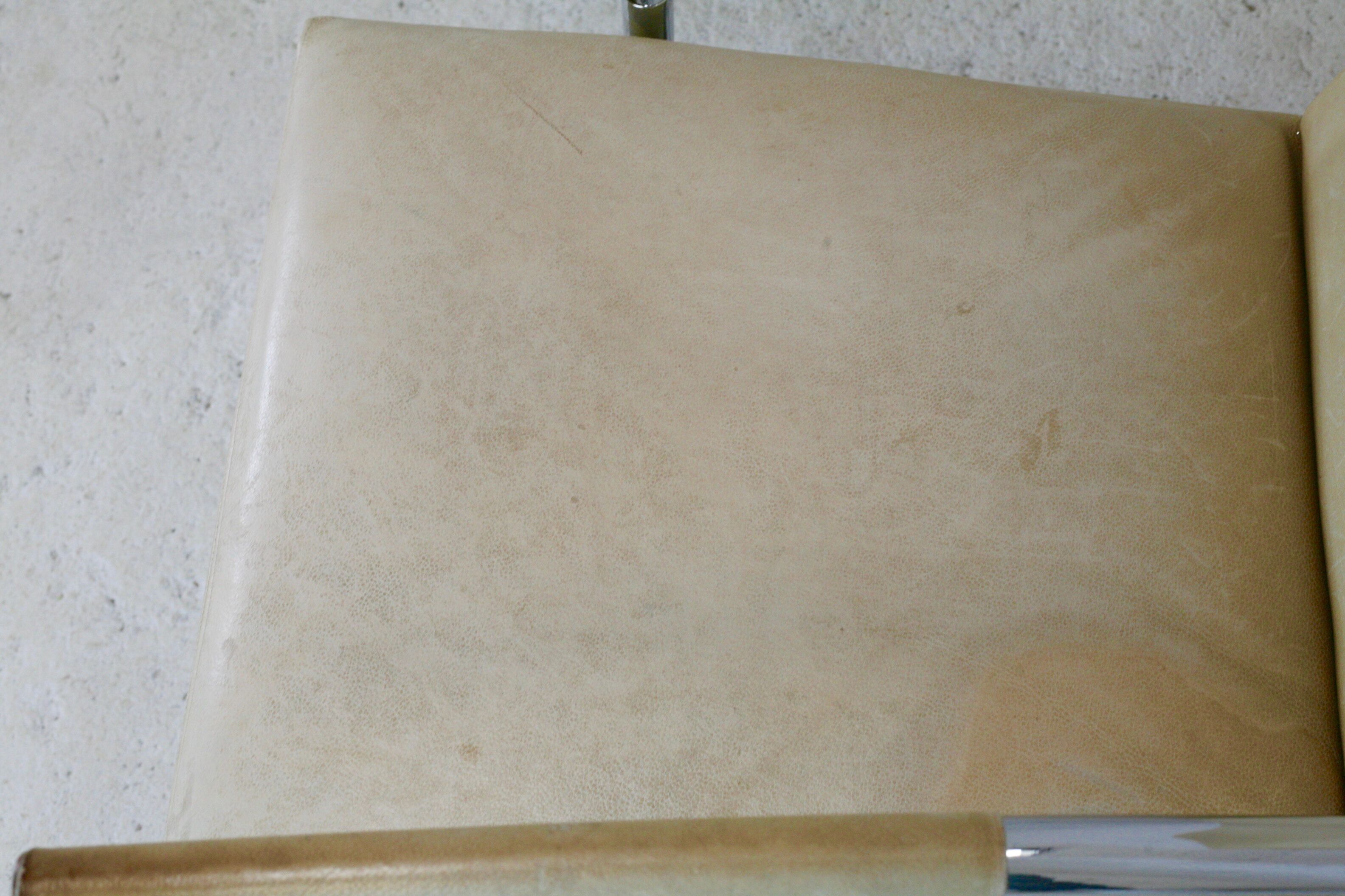 Tubular steel armchair and "cream" leather, France, circa 1970