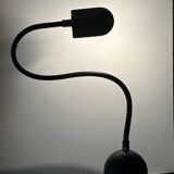 Articulated table lamp on vintage metal flexible