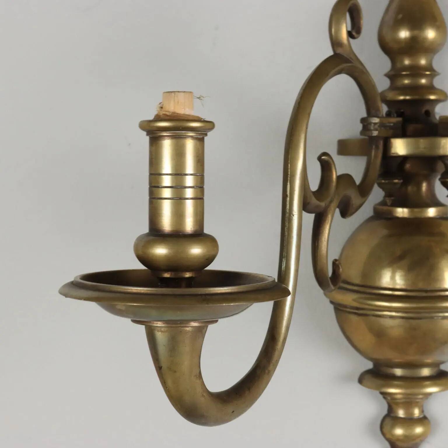 Pair of antique wall sconces in 20th-century Baroque style.