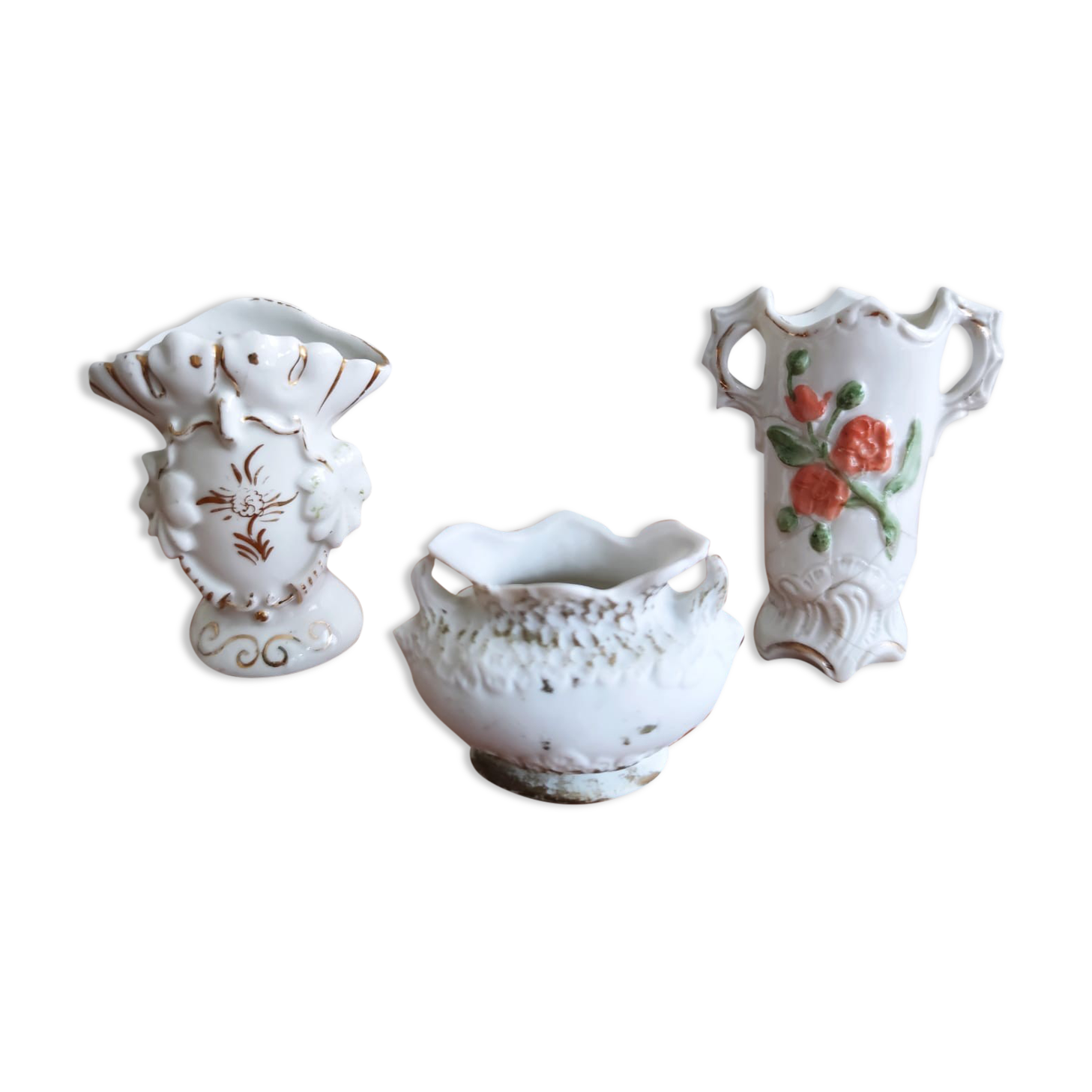 3 bouquetières in porcelain and biscuit