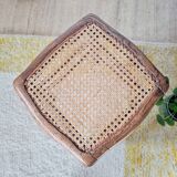 Wooden stool with cane seat