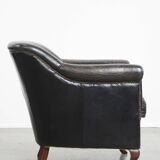 Black grained cowhide leather armchair