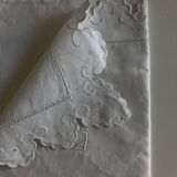 Pair of 19th century linen thread pillowcases embroidered with scallops
