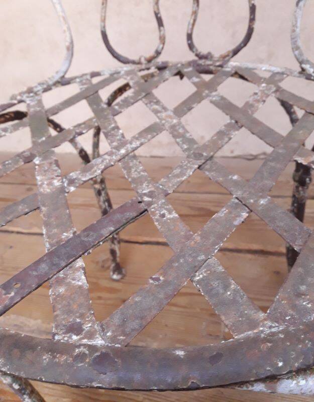 19th-century garden armchair in wrought iron
