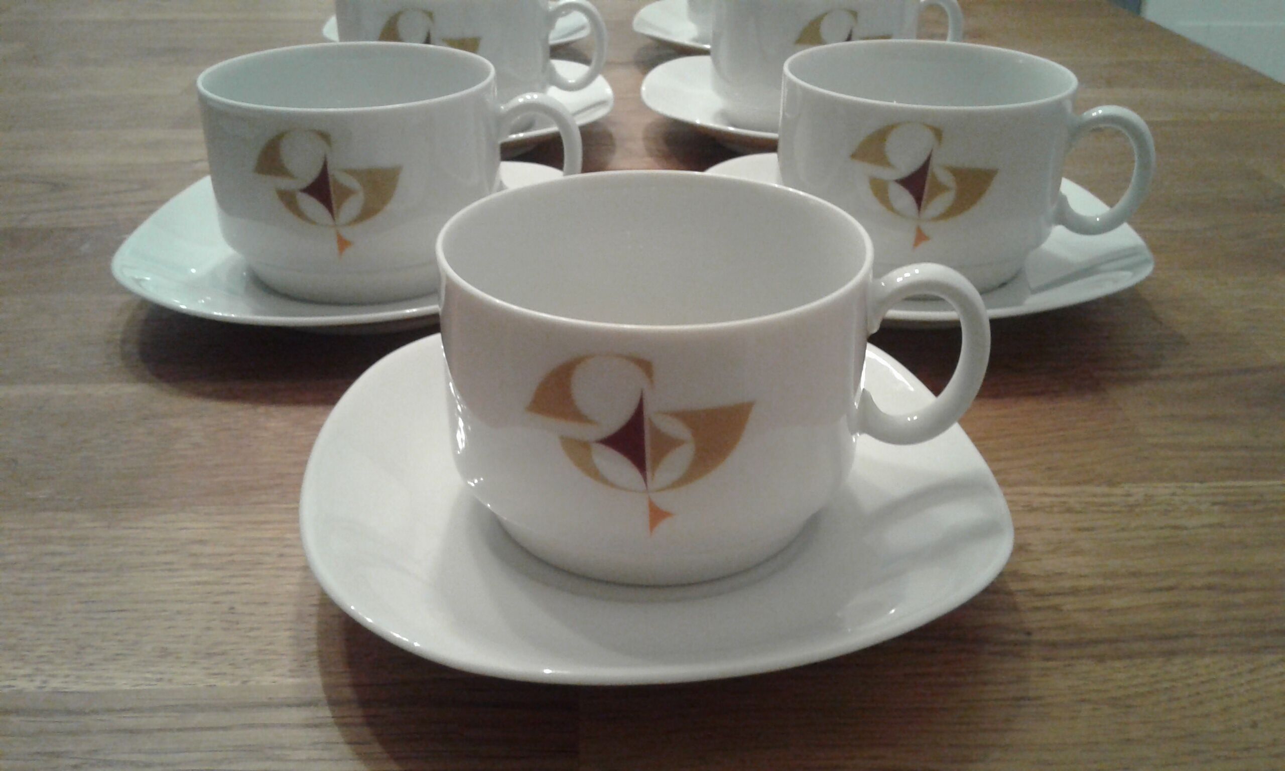 Set consisting of 7 cups and 7 sub cups. Porcelain. Vintage