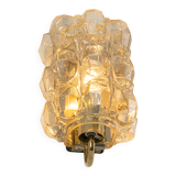 Large amber wall lamp in bubble glass by Helena Tynell, Limburg, Germany.