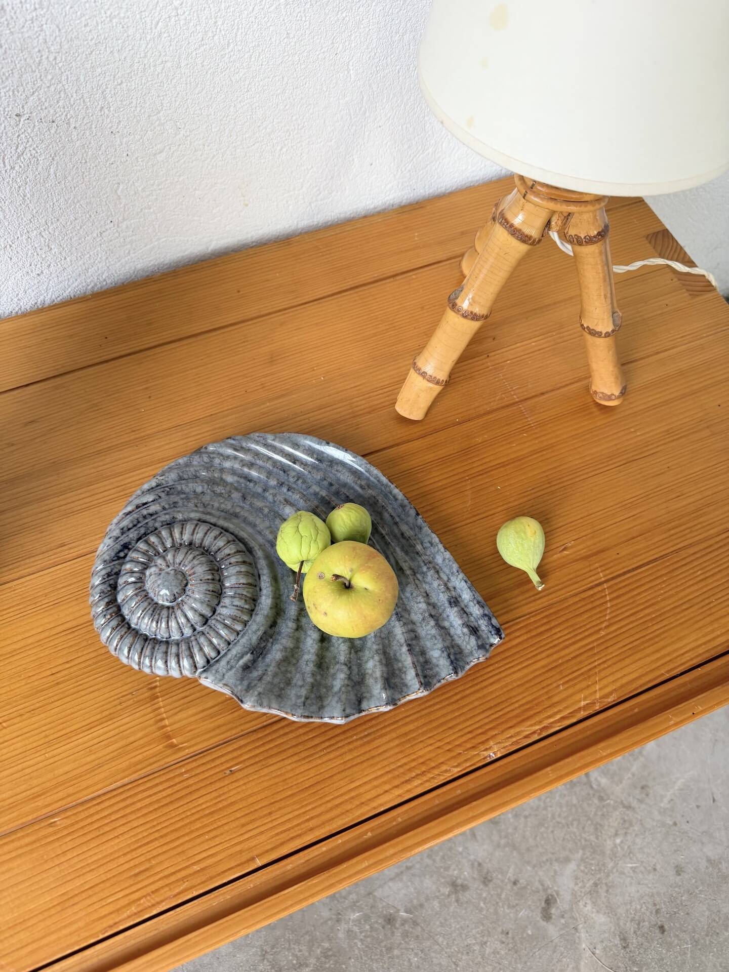 Shell-shaped ceramic catchall.