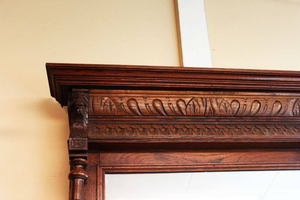 Oak mirror, Renaissance style, 20th century.