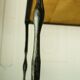 Signed black steel-ceramic side table