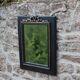 Miroir vintage en bois noir et doré à fronton – style Napoléon III