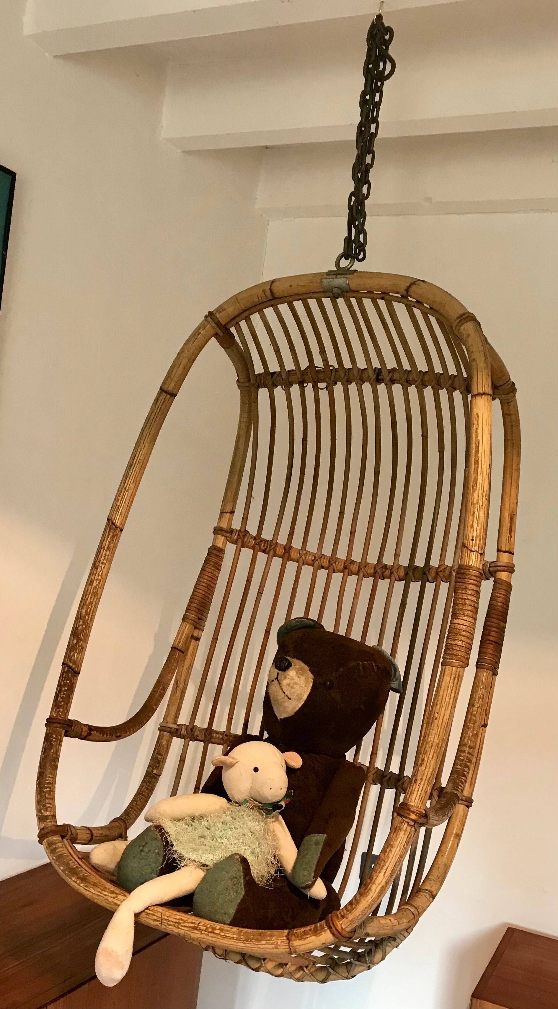 Vintage chair suspended in rattan