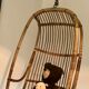 Vintage chair suspended in rattan