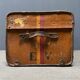 Antique brown travel case with wooden slides from the early 1900s